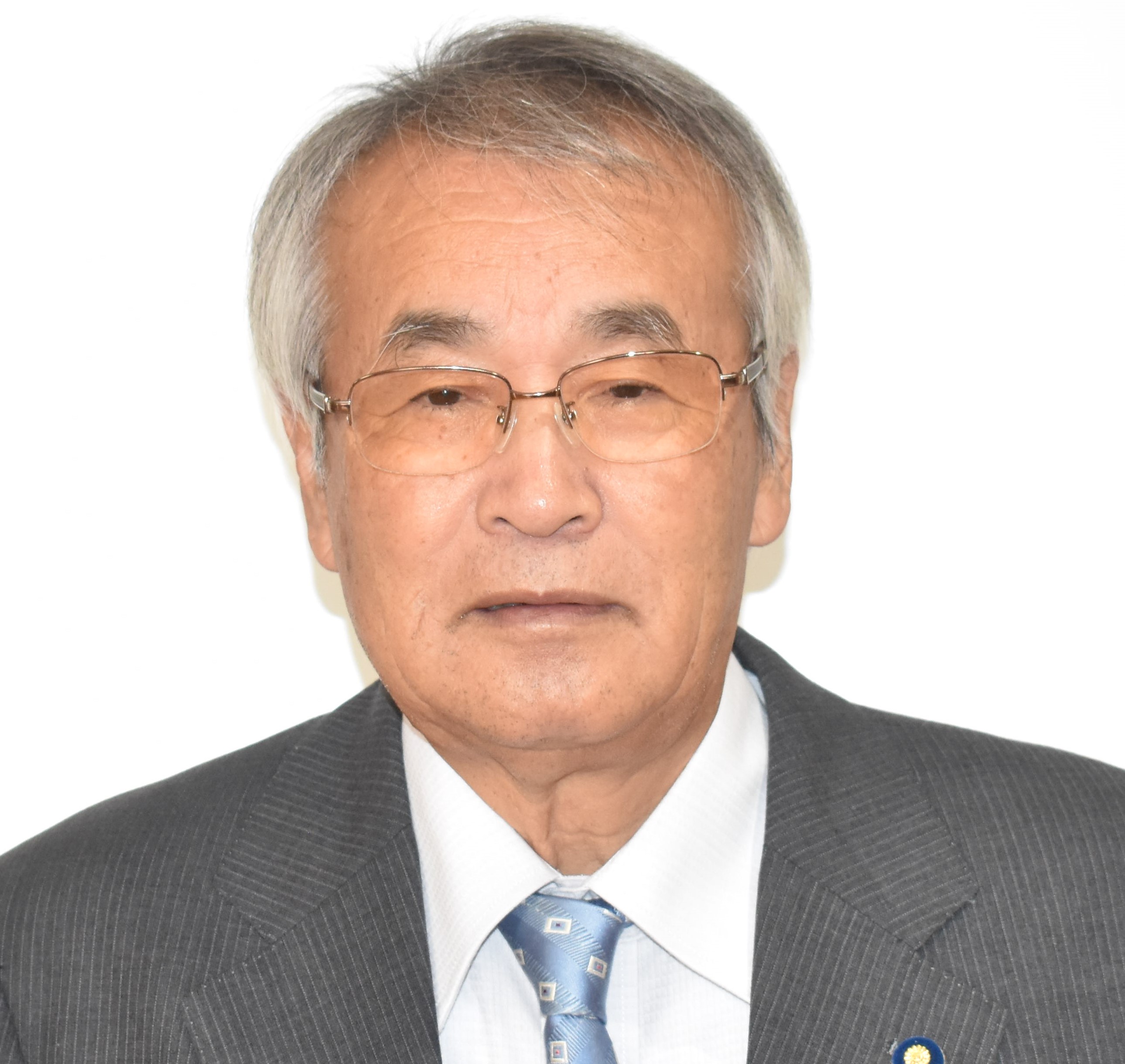 石 田 実